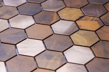The hexagonal texture of copper tiles. Geometric background