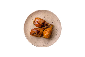 Delicious Asian dish with chicken legs in teriyaki sauce with salt and spices