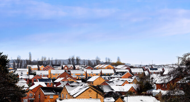 Winter Landscape,England rural village,Countryside in small town cover with snow, blue sky ,cloud,View Row of Typical English Terraced under snow in Middlebrough,North of England