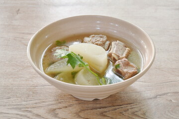 boiled slice radish with chop pork bone soup on bowl