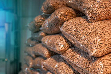 A ton of wooden pellets in 15 kg bags, delivered to a house for heating in winter, a natural and ecological way of producing energy.