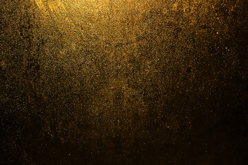 Black dark gold orange brown shiny glitter abstract background with space. Twinkling glow stars effect. Like outer space, night sky, universe. Rusty, rough surface, grain.