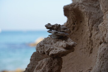 Balancing stones on a beach. Zen Style Stones by the Sea
