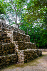 Coba Maya Ruins pyramids and ball game tropical jungle Mexico.