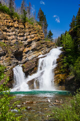Fototapeta na wymiar A scenic view of Cameron Falls in Waterton National Park in Alberta, Canada