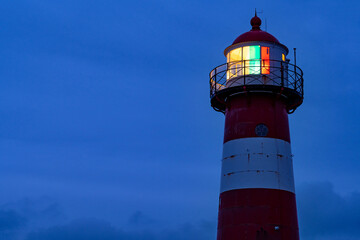 short lighthouse of Westkapelle, Netherlands at dusk
