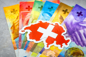 Switzerland money, Swiss francs, all banknotes, national flag and shape of Switzerland, Financial business concept, gray background. copy space