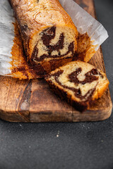 vanilla roll cake with chocolate sweet dessert ready to eat tasty eating cooking appetizer meal food snack on the table
