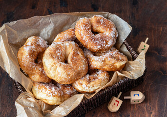 Homemade fresh fried donuts frosted with sugar.