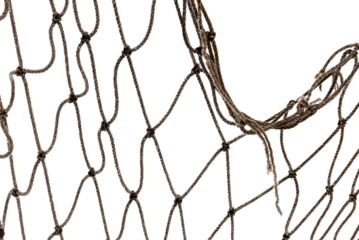 Icy mesh made of rope in the snow on a white background. Torn fishing, football, tennis net isolate