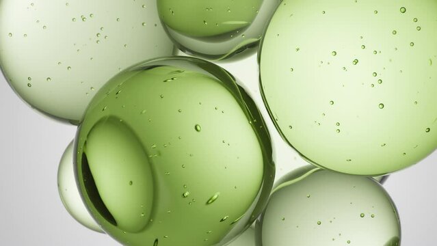 Cosmetics green serum liquid bubbles 3d abstract background. Cosmetic moisturizer essence gel. Collagen fluid bubble molecule. Moisturizing cream or oil. Personal health care and beauty skin concept