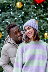 Smiling woman with black-skinned partner