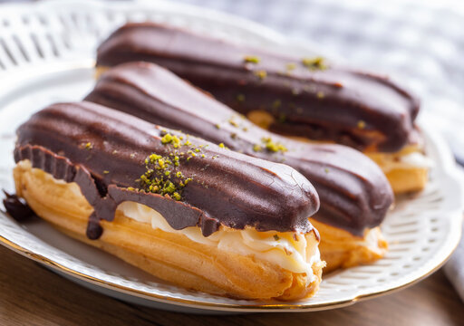 Traditional french eclairs with chocolate.
