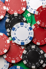 Poker chips on the white background