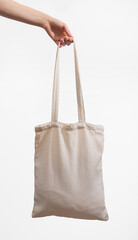 Natural linen tote bag mockup in hand. Organic textile shopper, totebag