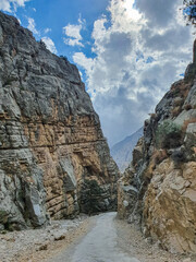 A road towards a valley in the mountains