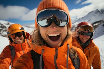 Portrait of skiers in orange jackets wearing ski googles  - obrazy, fototapety, plakaty