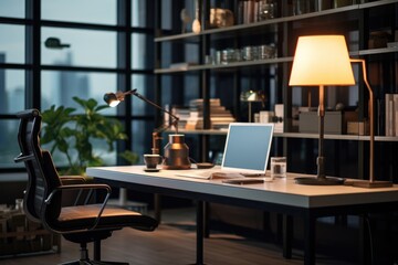 A simple and functional desk setup with a laptop and a lamp. Perfect for work or study.