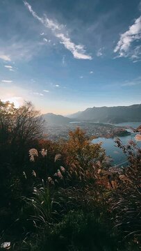 sunset in the mountains, lake, woman, autumn, people, couple, wall, park, walking, person, outdoors, tourist, architecture, city, fall, stone, ancient, beauty, old, building, day, one, smile, fashion,
