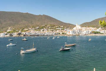 city ​​landscape on the costa brava in summer with white houses and boats