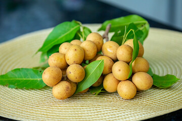 Ripe Pitomba fruits (talisia esculenta), an exotic fruit from the Brazilian tropical forest and bioma cerrado. Ripens in the months of November and December
