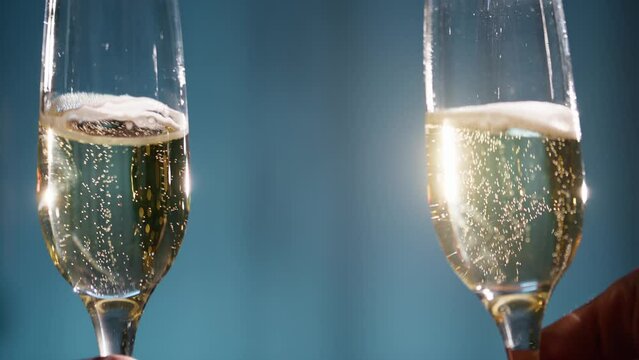 celebrating new Year with sparkling wine glasses 