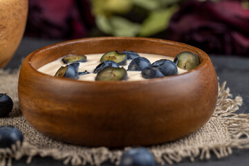 ripe blueberries and fresh creamy yogurt
