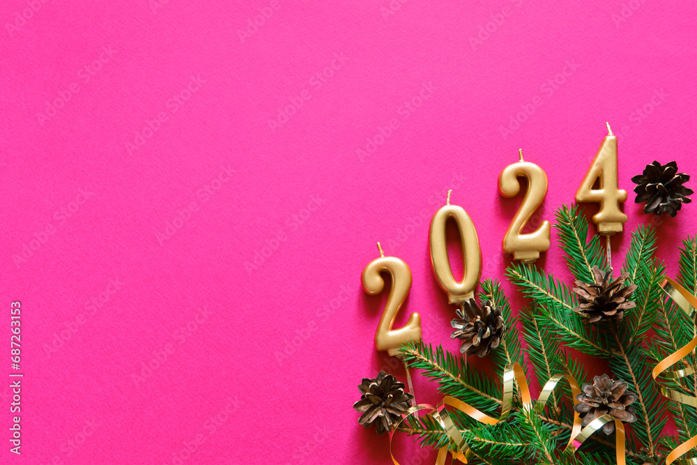 Wall mural pink christmas background. top view photo of christmas tree branches and cones with empty space. chr