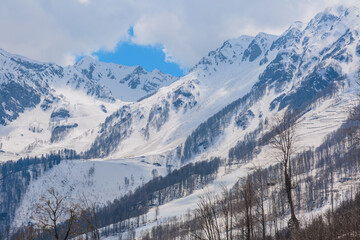 View from the peak of the Rose Peak of the Caucasus Mountains at the Rosa Khutor - 687263161