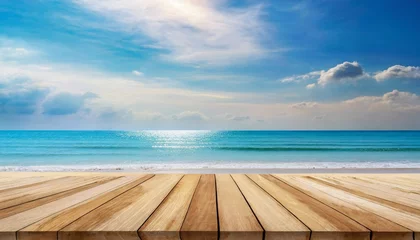 Draagtas tropical fine sandy beach with blured sea sun sky clouds background with wooden table top and empty space for product advertisement montage of summer relaxation background © Alicia