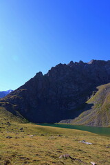 Ailampa lake located on Ak-Suu Traverse trek next to Jyrgalan and Karakol in Kyrgyzstan