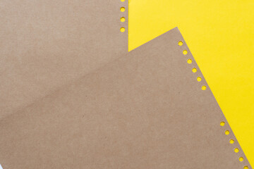 plain brown paper sheets on yellow