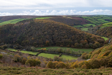 Obraz premium Landscape photo of the autumn colours in the Doone valley in Exmoor National Park
