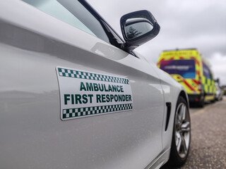 Ambulance first responder attending a medical emergency. UK volunteer community first responder car...