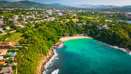 Puerto escondido drone approaching playa carrizalillo  surf spot in Oaxaca coastline Mexico