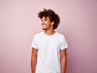a young male model wearing a blank T shirt for use as mockup with blank background