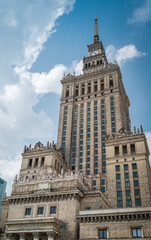 Palace of Culture in Warsaw against the background of a blue sky.