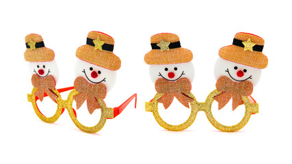 Funny Christmas or New Year's glasses and Christmas decorations isolated on white background. Holiday concept, retro style.