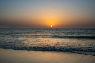 Fototapeta na wymiar Sunrise over the Atlantic Ocean from Sotavento Beach, Costa Calma, Fuerteventura, Spain