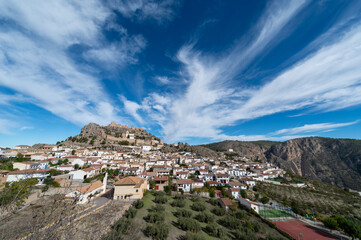 Wide angle view of the picturesque Granada town of Moclin (Spain) on a sunny autumn morning