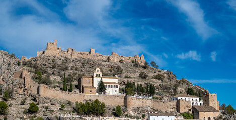 View of the fortified enclosure with the Cristo del Paño sanctuary and the remains of the Arab...
