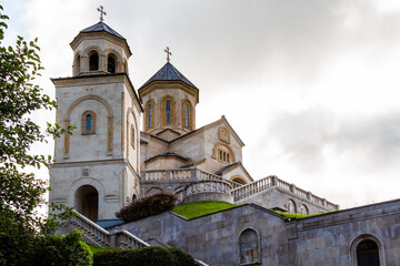 Fototapeta na wymiar travel to Georgia - bottom view of Holy Trinity Church on Sameba hill in Batumi city on cloudy autumn day