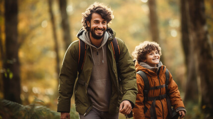 Fototapeta na wymiar smiling son and father walking with backpacks through the forest, nature reserve, hiking, tall trees, blurred background, man, boy, trail, tourists, travel, hike, family, weekend together, child, kid