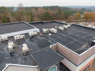 Professional Aerial Drone Image of EPDM Roof on a Commercial Building: Architecture, Roofing, Engineering © Oak City Drone