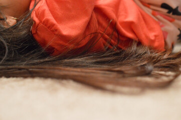 Close-Up of Child's Hair on Carpet