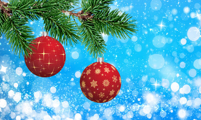 Christmas background with fir branches and red balls on blue bokeh