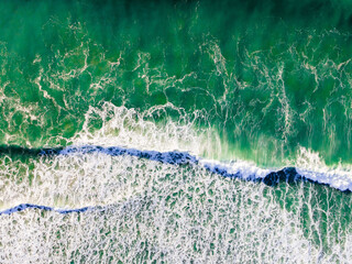 Aerial Serenity: Turquoise Waves from a Drone's Eye View – Perfect Graphic Design Background