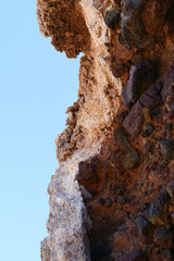Close up of the petrified coral and rock formations at Salar de Uyuni Salt Flat or lake, a popular travel destination, from  Incahuasi island, Potosi, Bolivia. Vertical image