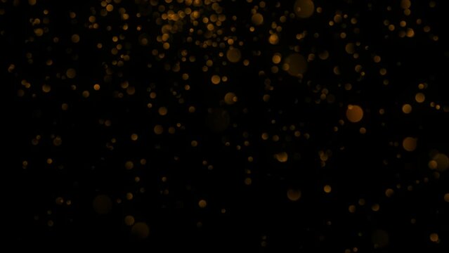 Bokeh shining colorful particles. Shimmering Glittering Particles loop animation with Alpha Channel transparent background