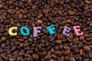 The inscription coffee on coffee beans